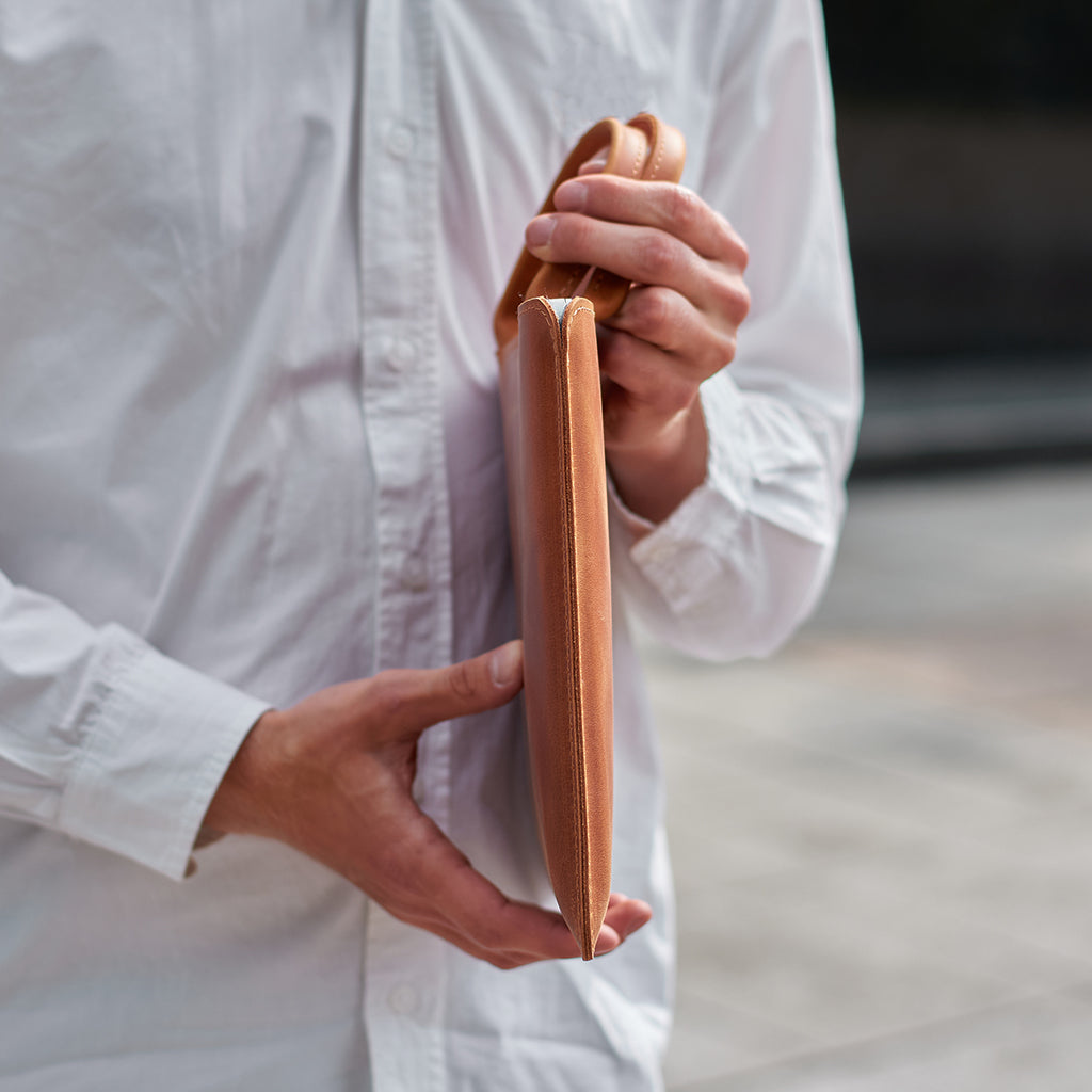 Manche d'ordinateur portable en cuir de tige