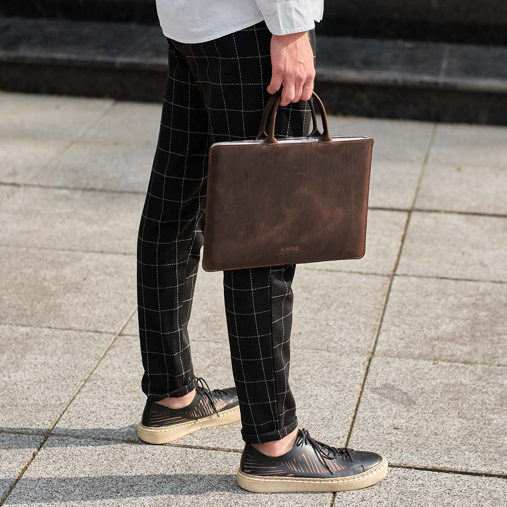 Manche d'ordinateur portable en cuir de tige