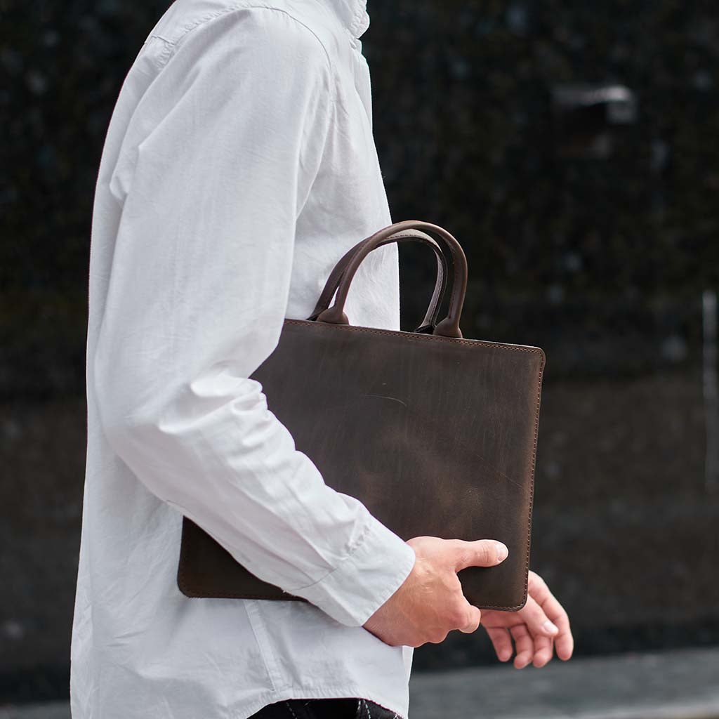 Manche d'ordinateur portable en cuir de tige