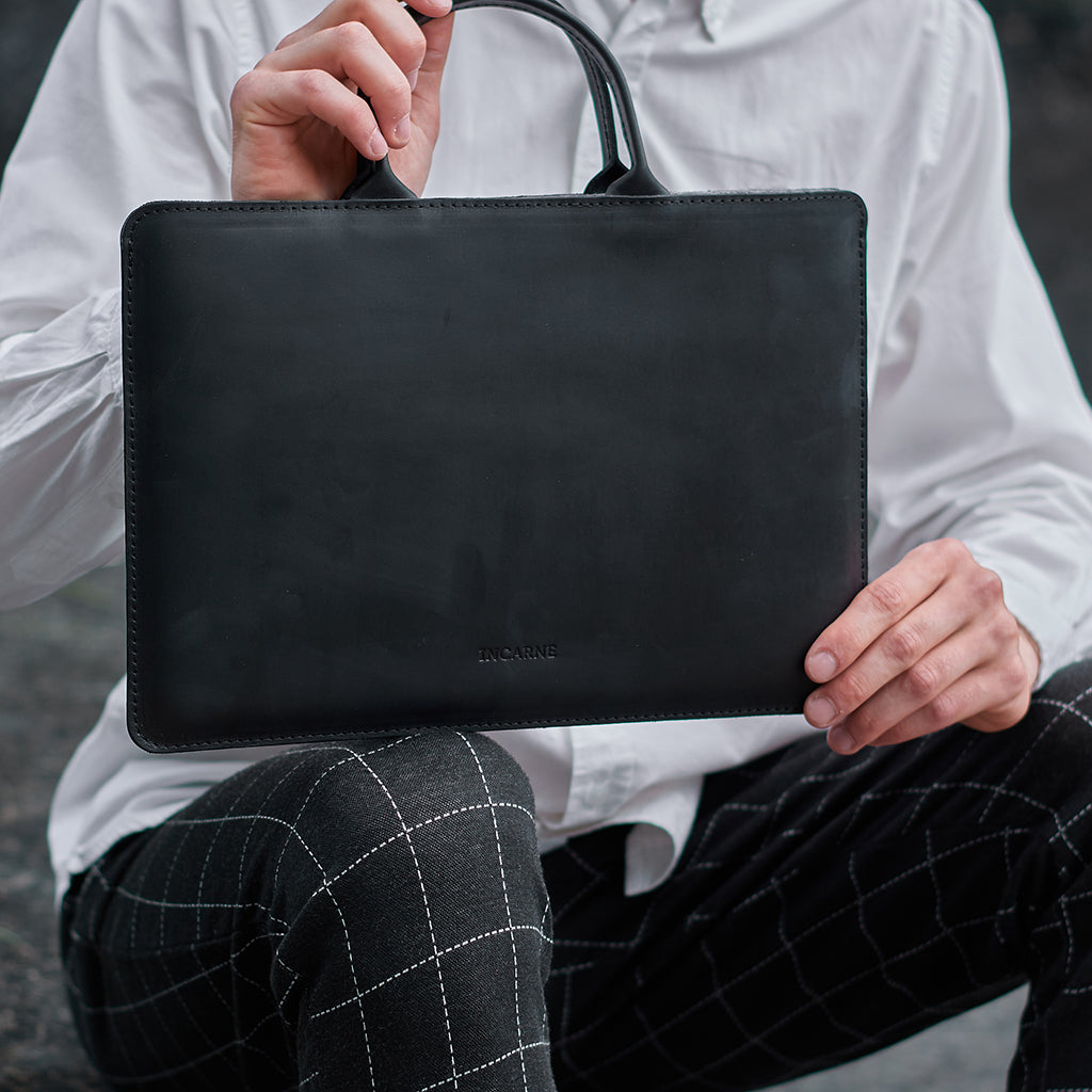Manche d'ordinateur portable en cuir de tige