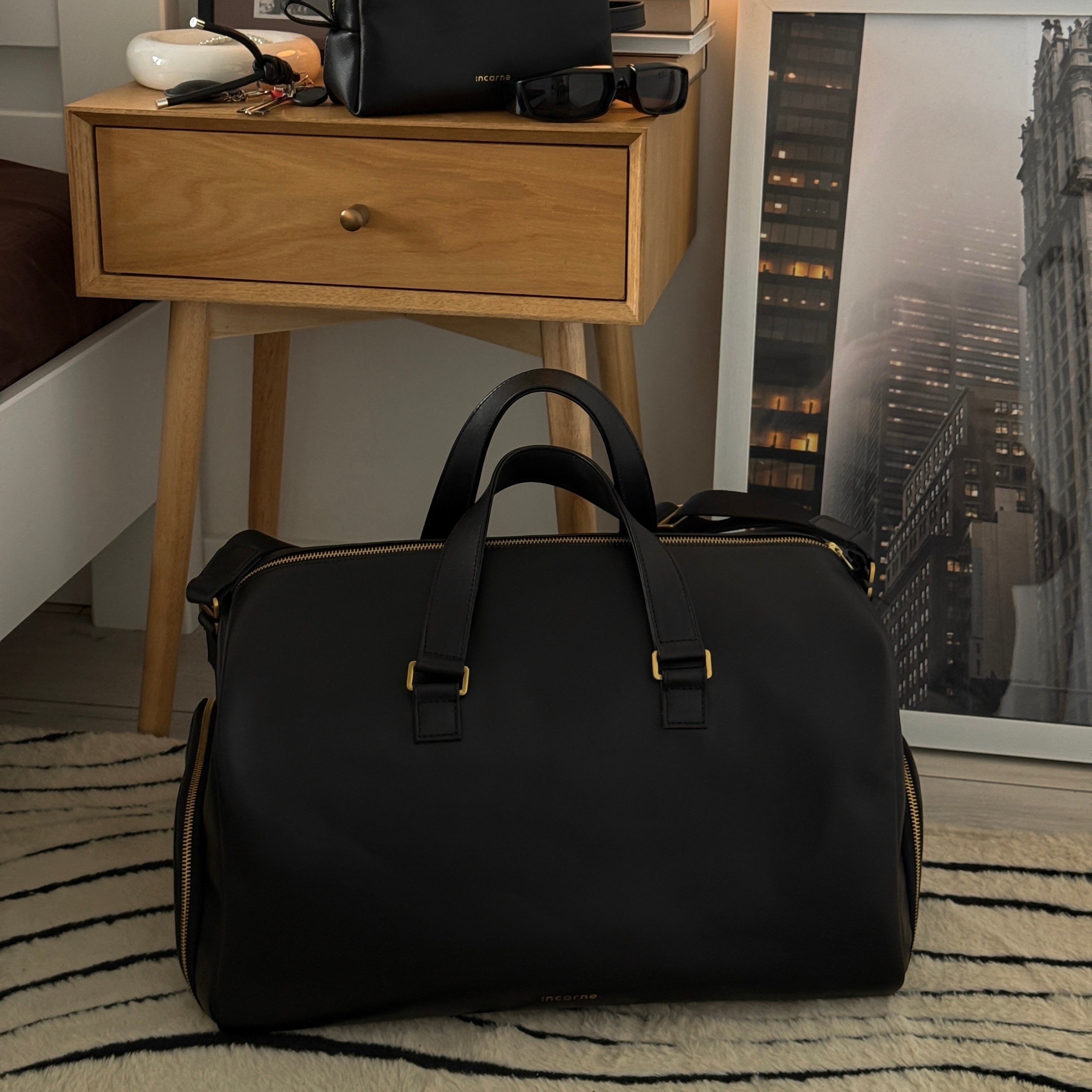 Nomad bag packed for gym use with sports shoes stored in separate side compartment