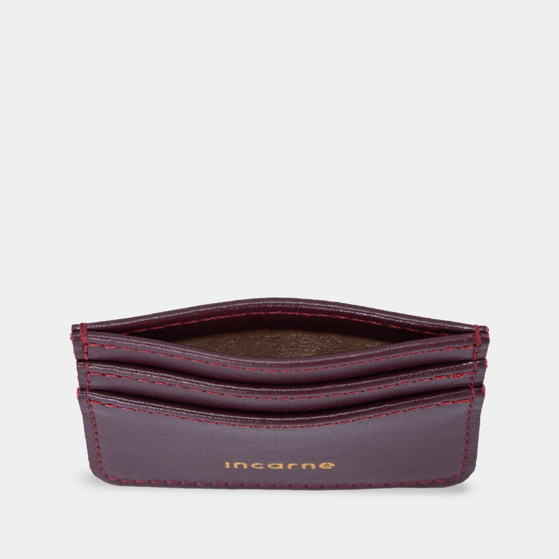 Minimal burgundy cardholder with cards inside