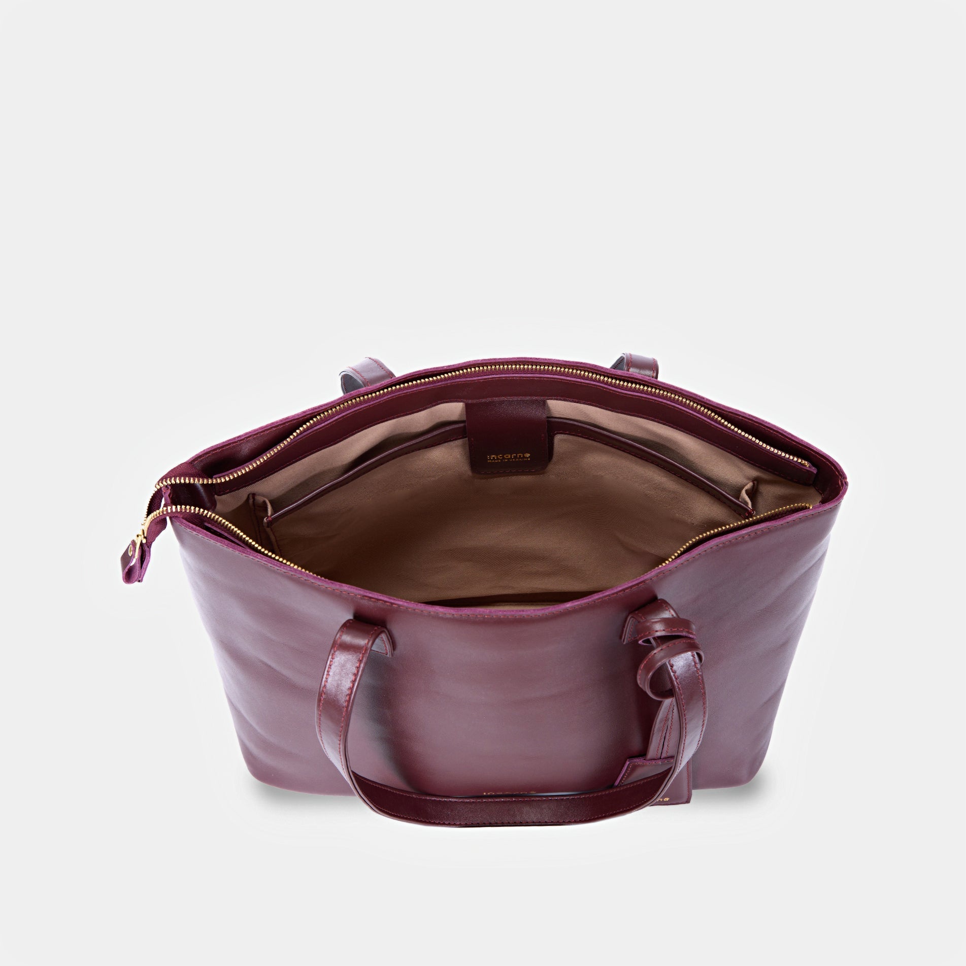 Interior of Emeli bag with laptop compartment and organizers